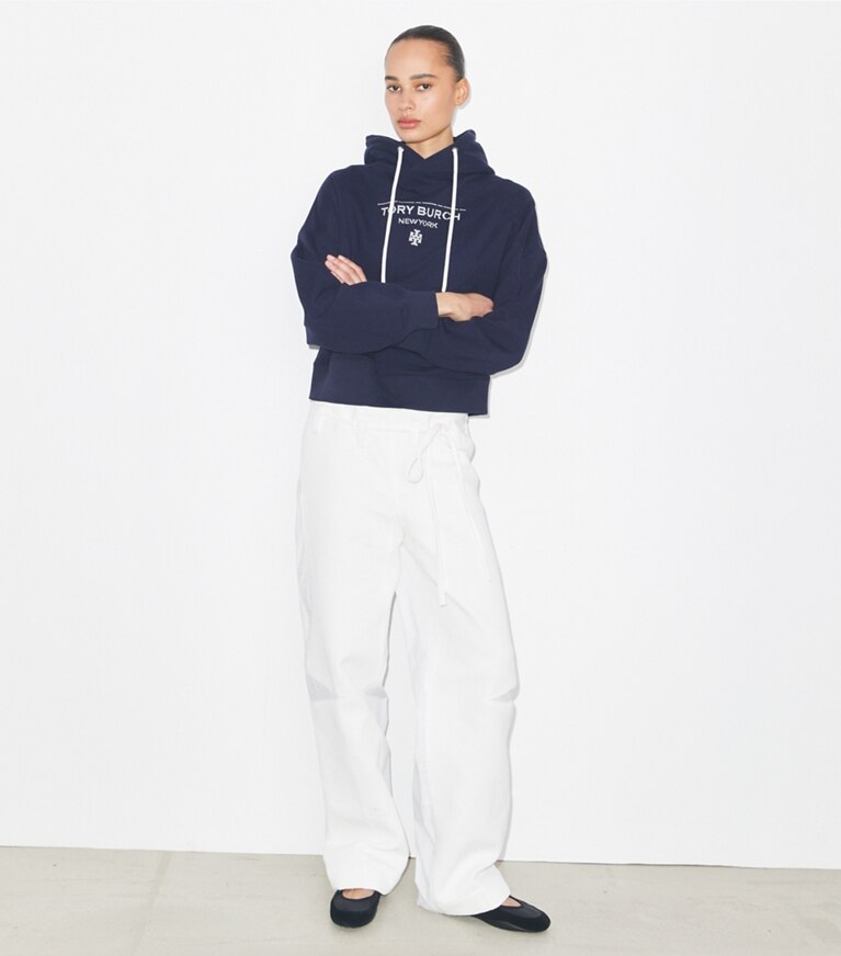 Tory Burch designer sweaters French Terry Hoodie in Medium Navy on model front