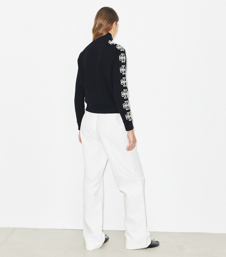 Tory Burch designer sweaters French Terry Logo Sleeve Half-Zip Sweatshirt in Black / New Ivory on model back