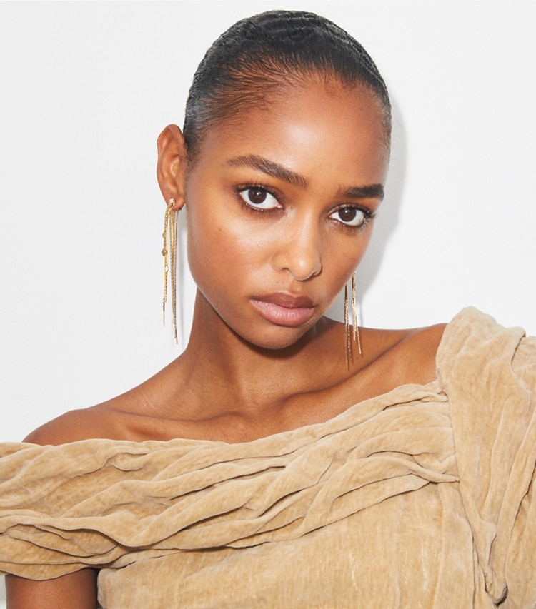 Tory Burch designer earrings Front-Back Chain Earrings in Tory Silver / Crystal accessory on model