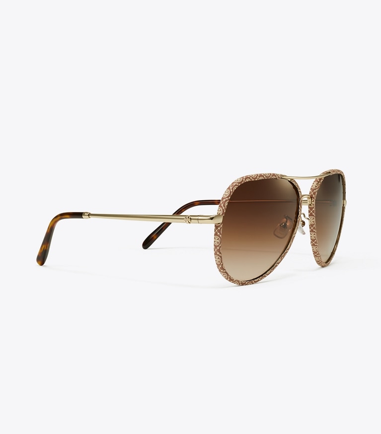 Tory Burch diseñador gafas de sol y gafas graduadas Gafas de sol tipo aviador Eleanor en LIGHT GOLD/T MONOGRAM/BROWN GRADIENT detalle