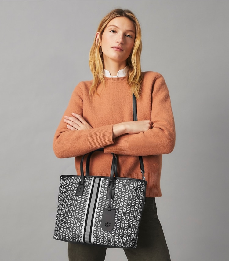 Tory Burch designer tote bags Gemini Link Canvas Small Top-Zip Tote Bag in Black Gemini Link accessory on model