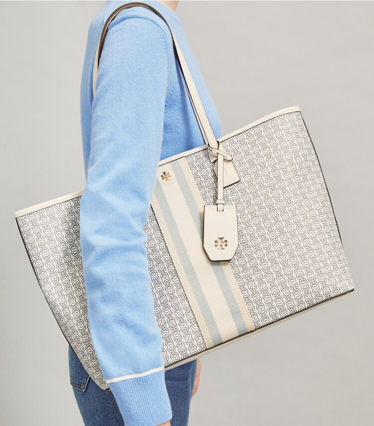 Tory Burch designer tote bags Gemini Link Canvas Tote Bag in New Ivory Gemini Link accessory on model