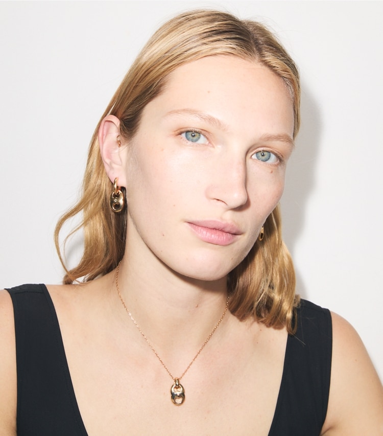 Tory Burch designer necklaces Gemini Link Pendant Necklace in Light Brass accessory on model