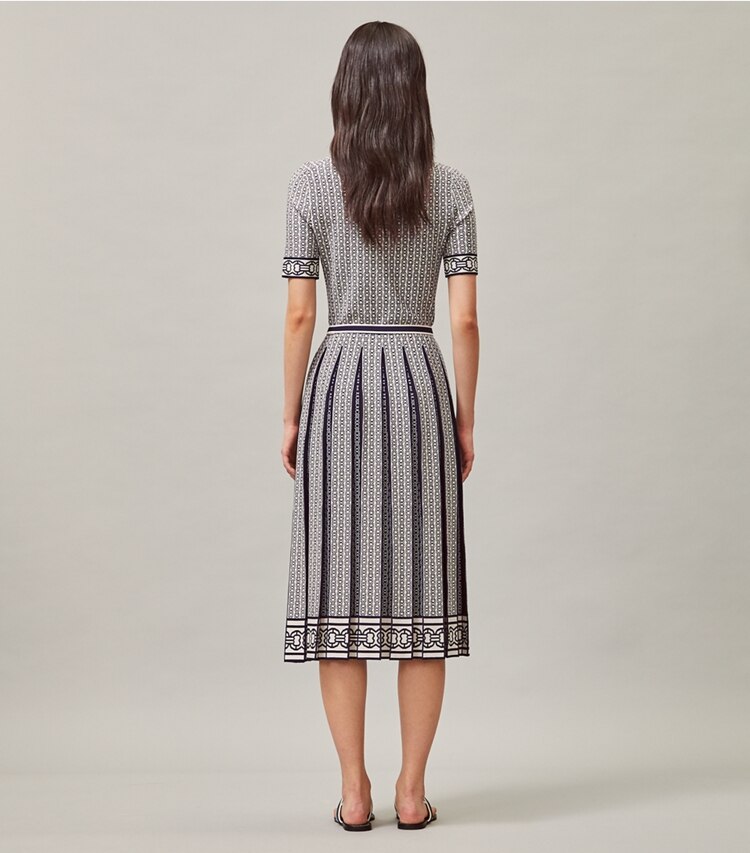 Tory Burch designer dresses Gemini Link Polo Dress in New Ivory Gemini Link on model back