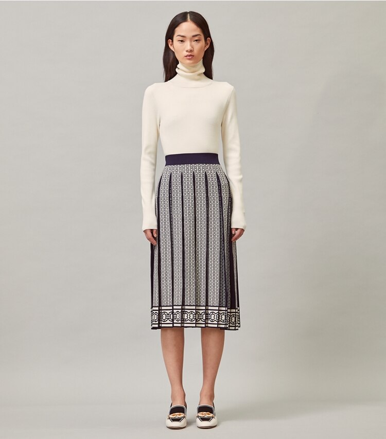 Tory Burch designer bottoms Gemini Link Skirt in New Ivory Gemini Link on model front