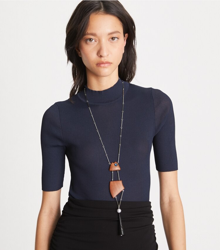 Tory Burch designer necklaces Geo Fish Necklace in Tory Silver/Multi accessory on model