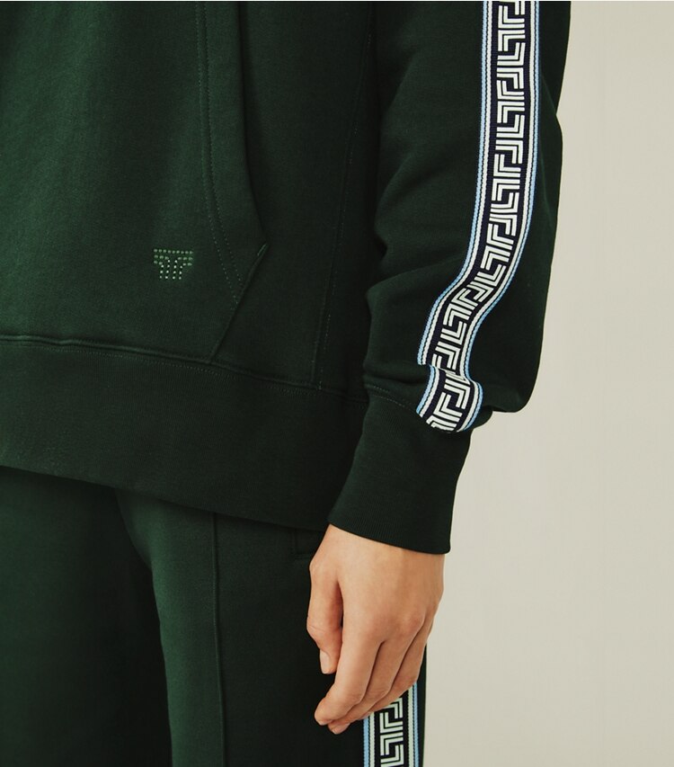 Tory Sport designer bottoms Geo-T Wide-Leg Track Pants in Conifer on model detail