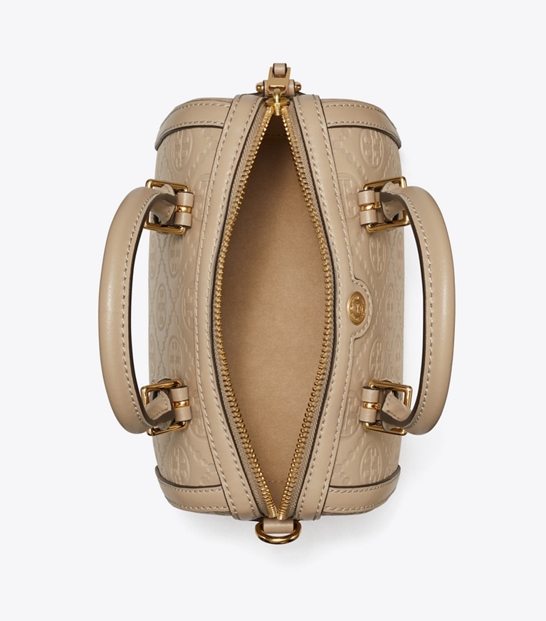 Tory Burch designer crossbody bags Geprägte Petite Barrel Bag mit T-Monogramm in Fresh Clay angle