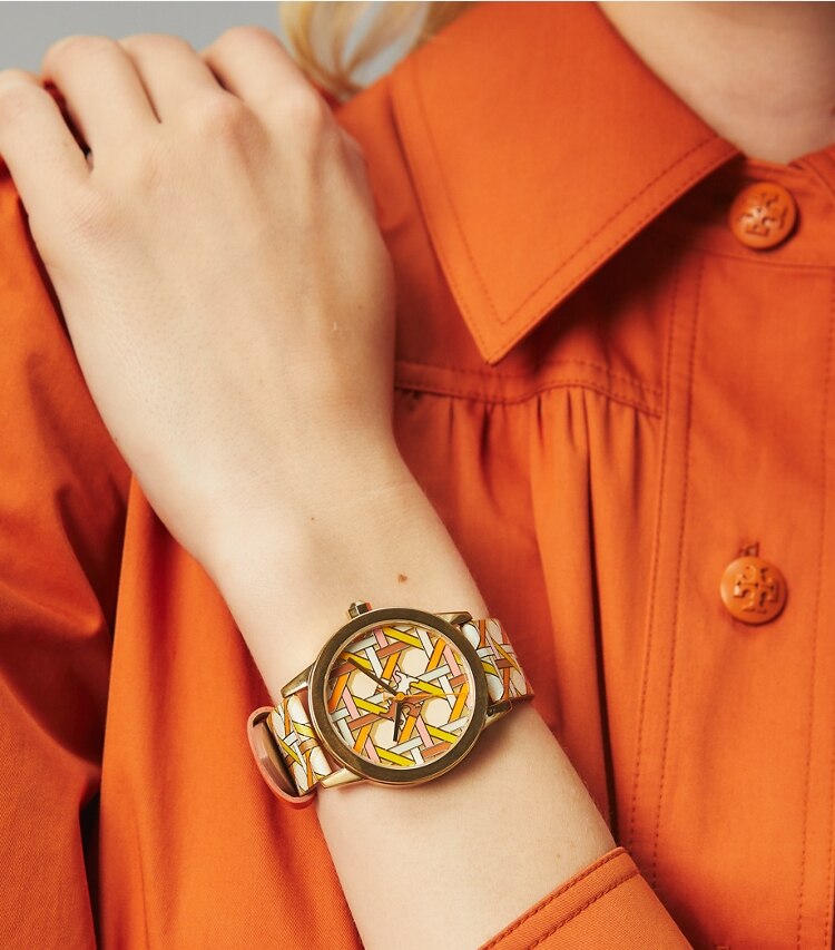Tory Burch designer strap watches Gigi Watch, Printed Leather/Gold-Tone, 36 x 42 MM in ORANGE/GOLD accessory on model
