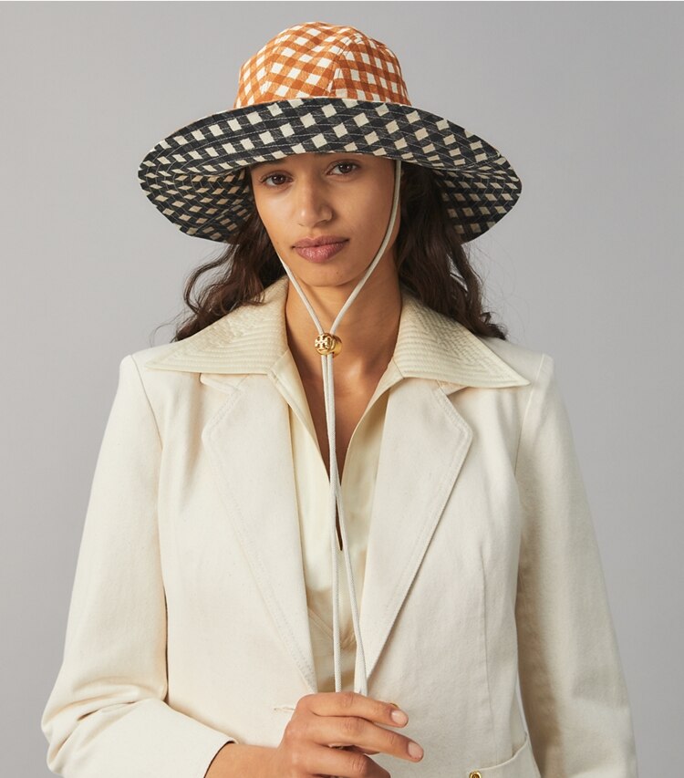 Tory Burch designer hats Gingham Reversible Bucket Hat in GINGHAM /  GINGHAM accessory on model