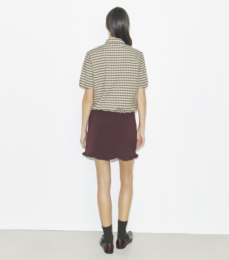 Tory Burch designer unterteile Golfrock mit Rüschen und Stretchanteil in Dark Sangria front