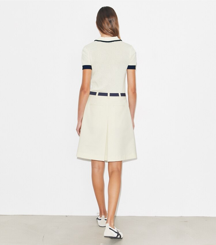 Tory Burch designer pantaloni Gonna da golf elasticizzata a pieghe in New Ivory on model back
