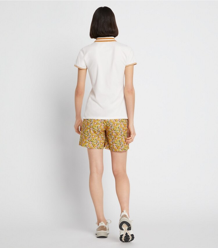 Tory Sport designer pantaloni Gonna da golf stampata in materiale tecnico in GINGER LILY VINTAGE BOUQUET on model back