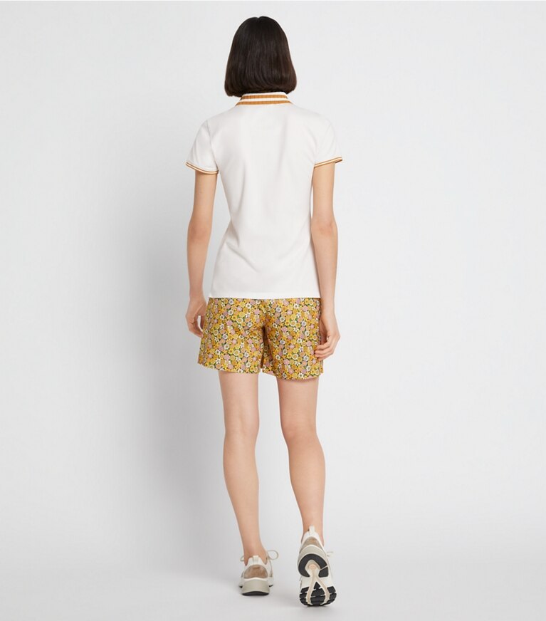 Tory Sport designer pantaloni Gonna da golf stampata in materiale tecnico in GINGER LILY VINTAGE BOUQUET on model back