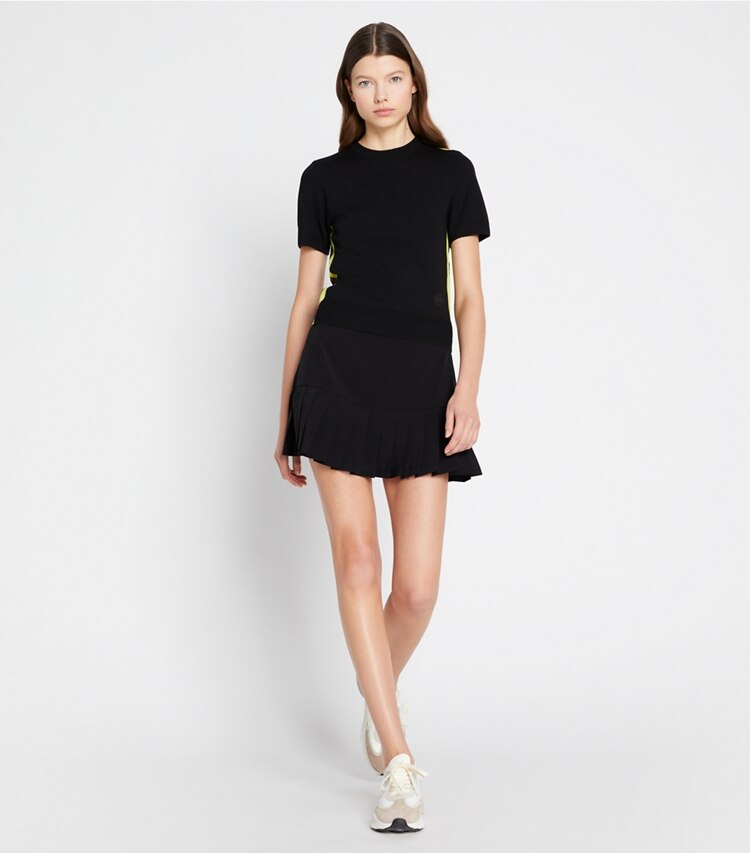 Tory Sport designer pantaloni Gonna da Tennis a pieghe in Black parte anteriore su modella