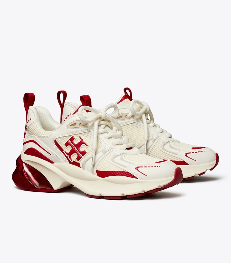Tory Burch designer sneakers Good Luck Tech Trainer in NEW IVORY / TORY RED angle