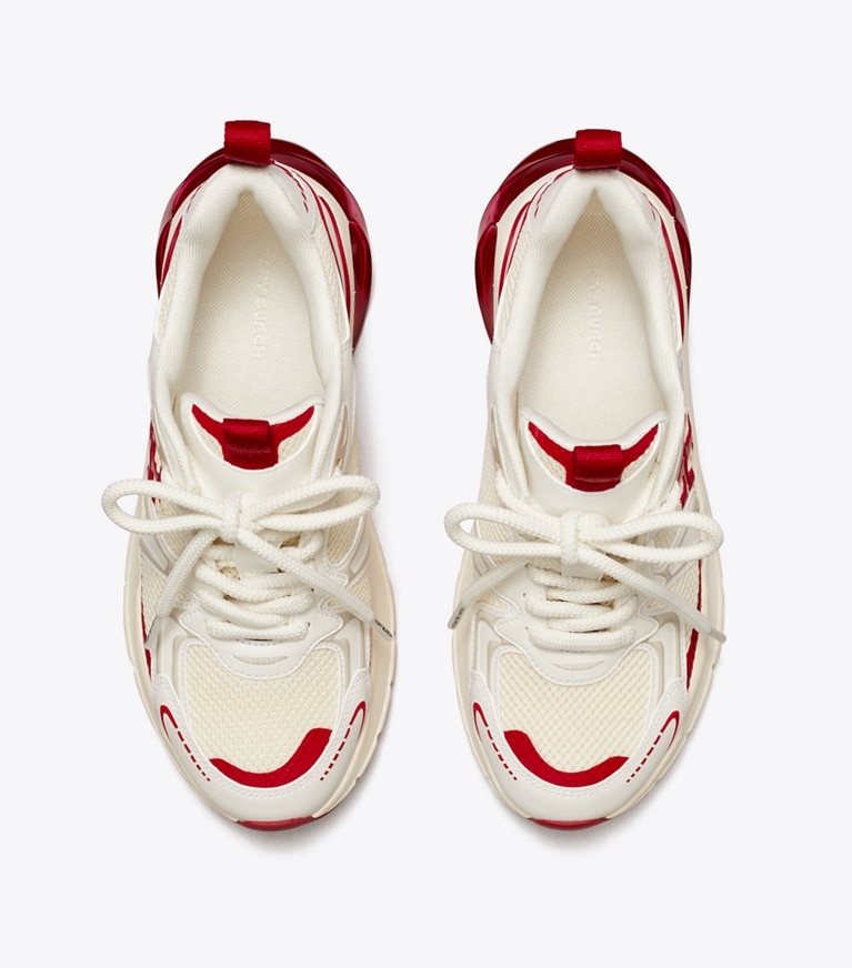 Tory Burch designer sneakers Good Luck Tech Trainer in NEW IVORY / TORY RED angle