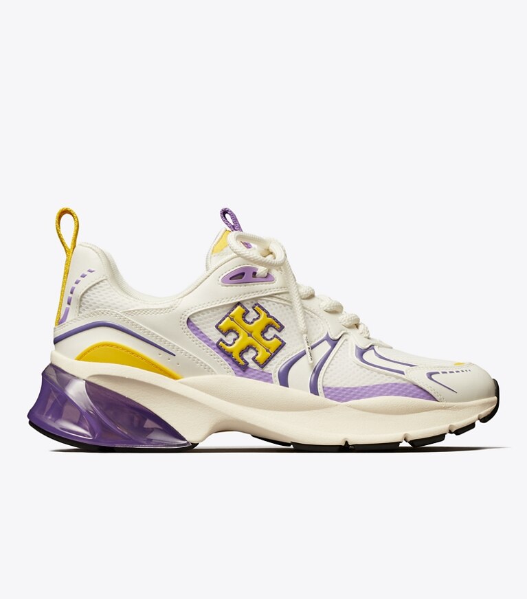 Tory Burch designer スニーカー グッドラック テック トレーナー in NEW IVORY/GOLDEN BRIGHT/DARK LOTUS angle