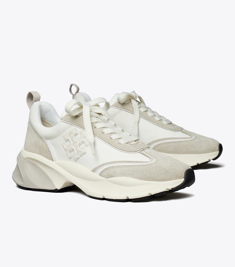 Tory Burch designer sneakers Good Luck Trainer in BIANCO / FOSSIL STONE angle