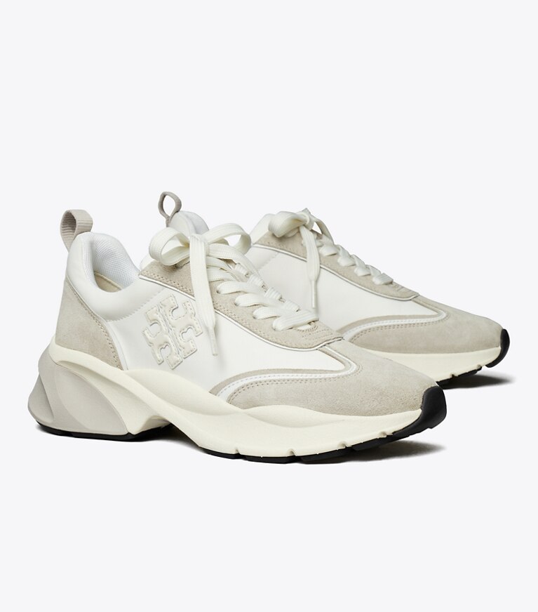 Tory Burch designer sneakers Good Luck Trainer in BIANCO / FOSSIL STONE angle