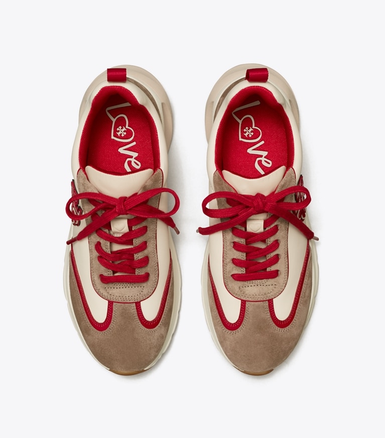 Tory Burch designer sneakers Good Luck Trainer in New Cream / Taupe / TORY RED overhead