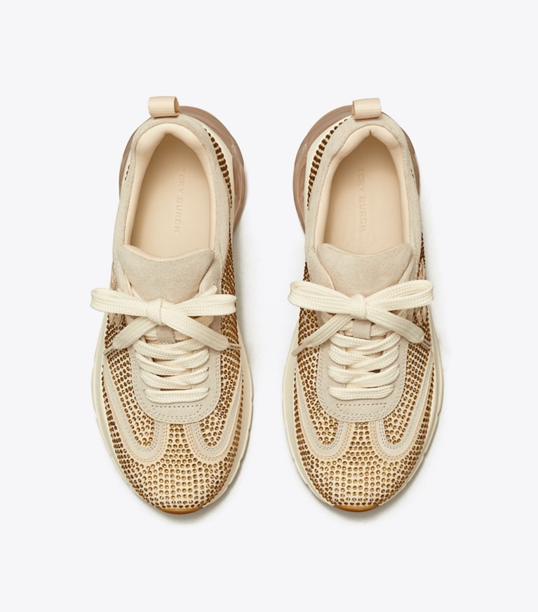 Tory Burch designer sneakers Good Luck Trainer in CHAMPAGNE / CALCARE / NEW CREAM angle