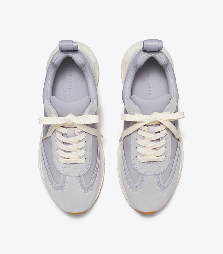 Tory Burch designer sneakers Good Luck Trainer in SPRING LAVENDER angle