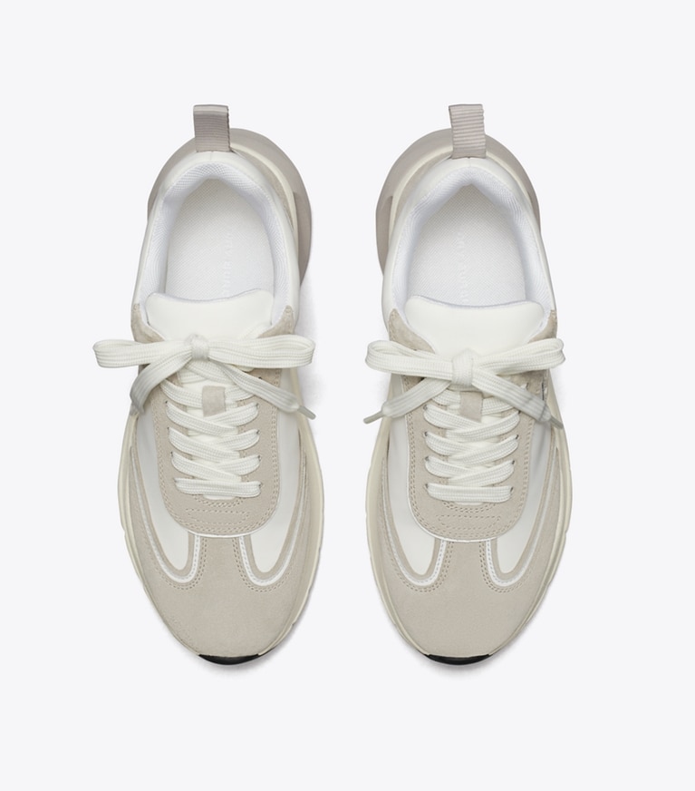 Tory Burch designer sneakers Good Luck Trainer in BIANCO / FOSSIL STONE angle
