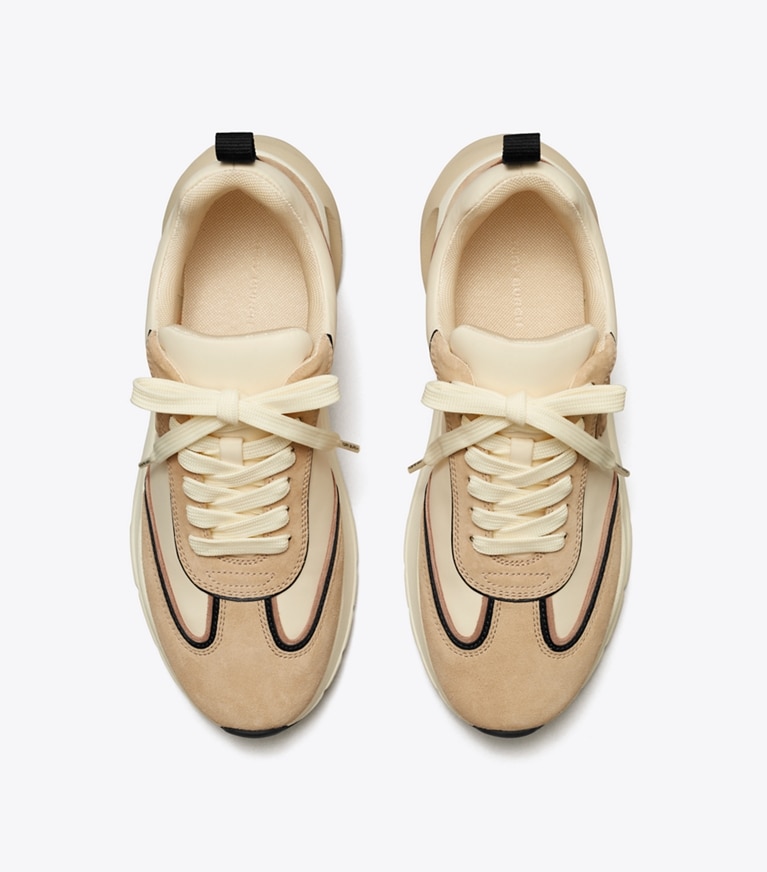 Tory Burch designer sneakers Good Luck Trainer in FRENCH PEARL / LINO angle