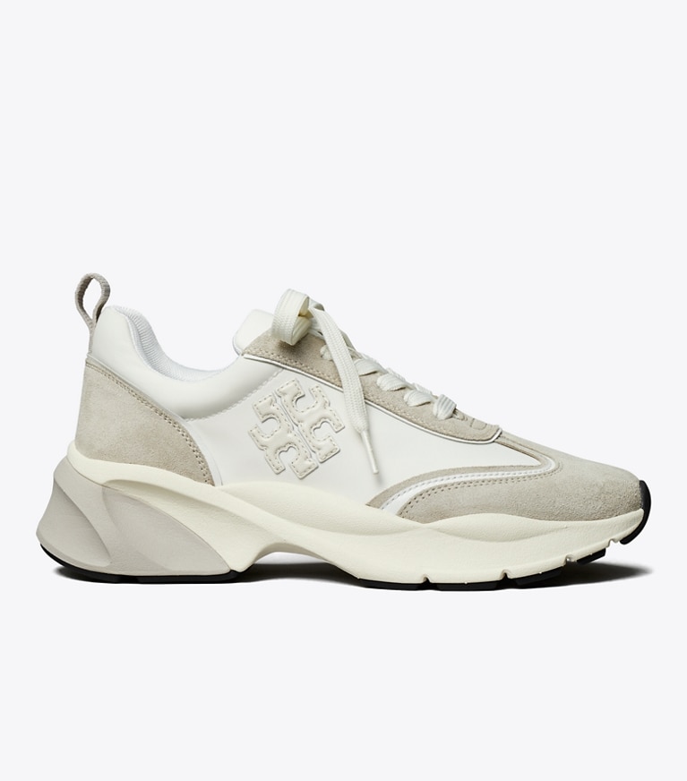 Tory Burch designer sneakers Good Luck Trainer in BIANCO / FOSSIL STONE angle
