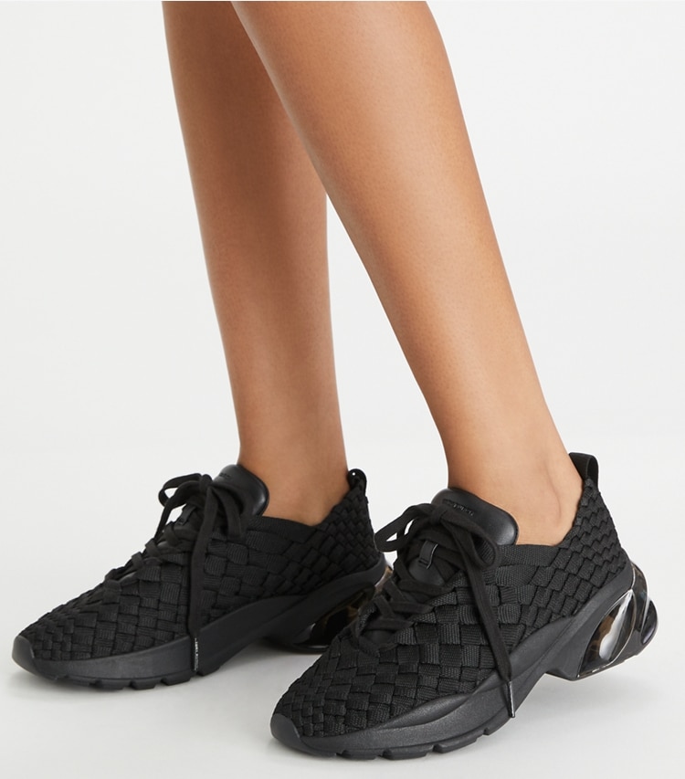 Tory Burch designer sneakers Good Luck Woven Trainer in PERFECT BLACK accessory on model