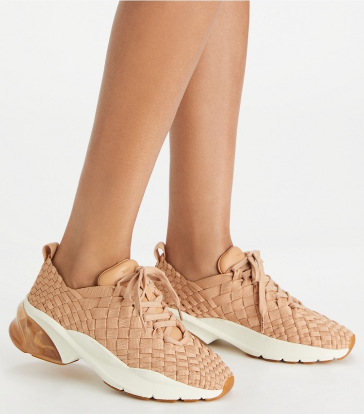 Tory Burch designer sneakers Good Luck Woven Trainer in VINTAGE BLUSH accessory on model