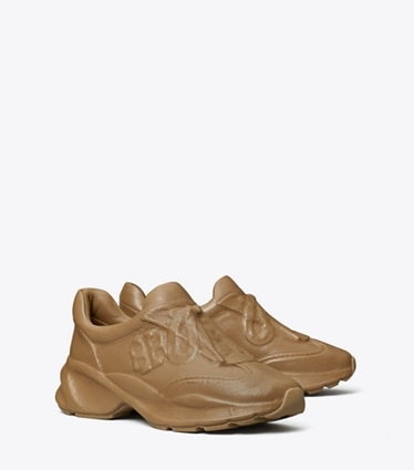 Tory Burch designer sneakers Good Luck X-Ray Trainer in LIGHT CHAI angle