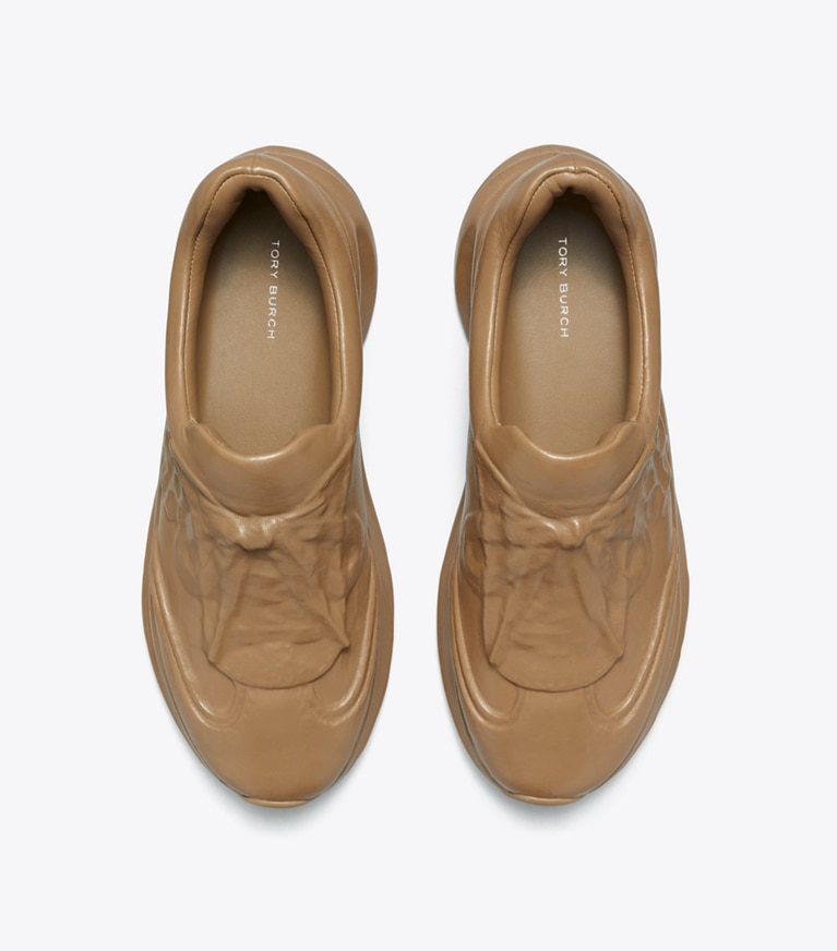 Tory Burch designer sneakers Good Luck X-Ray Trainer in LIGHT CHAI angle