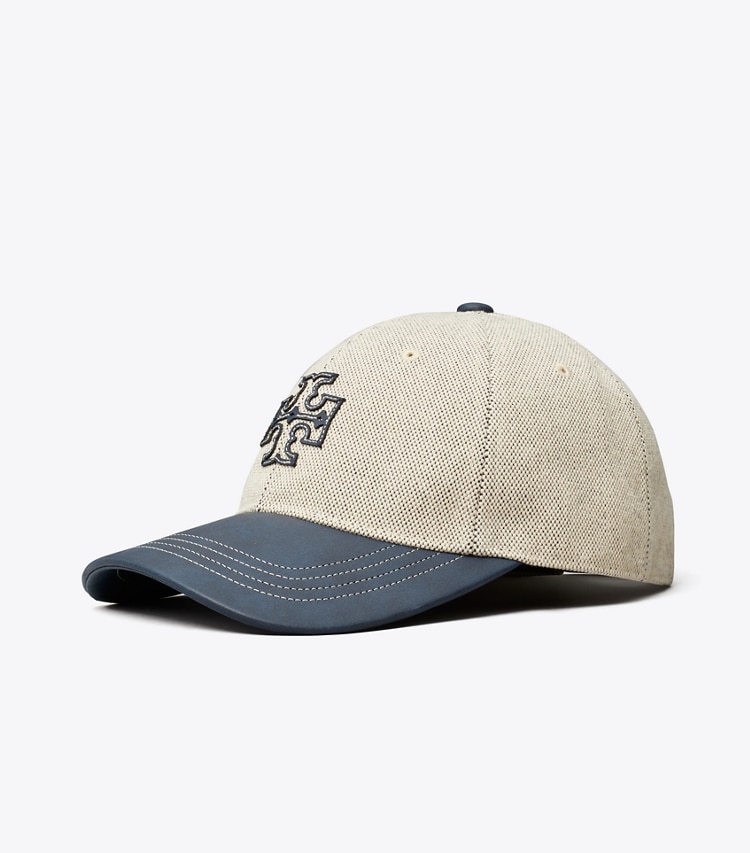 Tory Sport diseñador sombreros Gorra de lona en dos tonos en Natural/ Tory Navy ángulo
