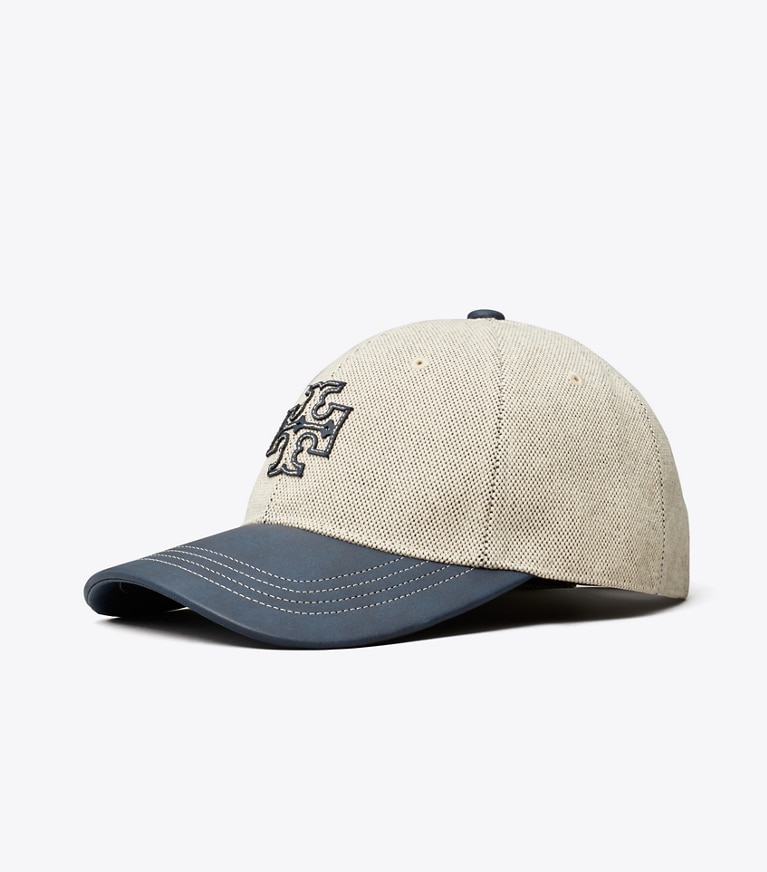 Tory Sport diseñador sombreros Gorra de lona en dos tonos en Natural/ Tory Navy ángulo