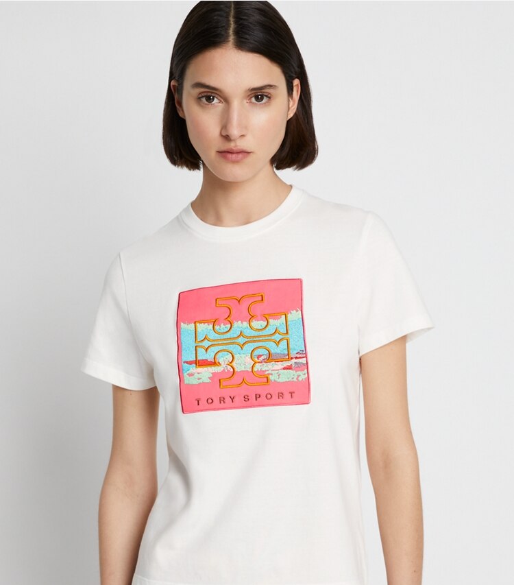 Tory Sport designer tops Graphic Logo Patch T-Shirt in Snow White on model detail