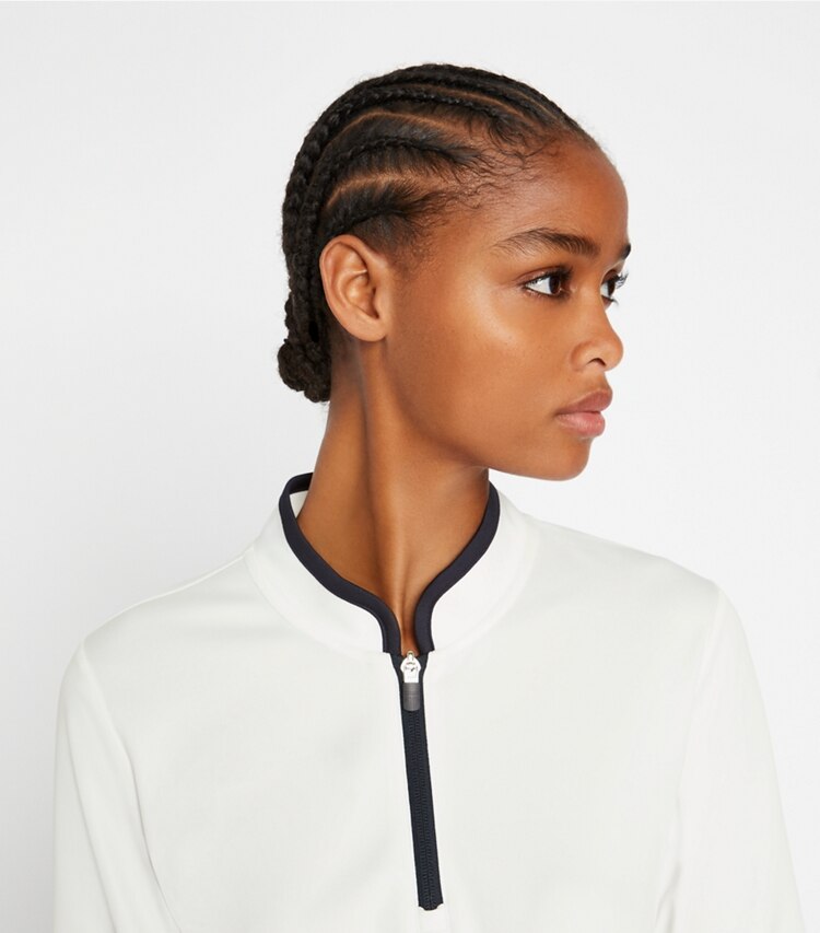 Tory Sport designer tops Half-Zip Performance Pullover in Snow White on model detail
