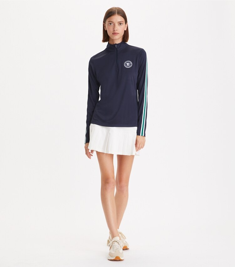 Tory Sport designer tops Half-Zip Performance Pullover in Tory Navy on model front