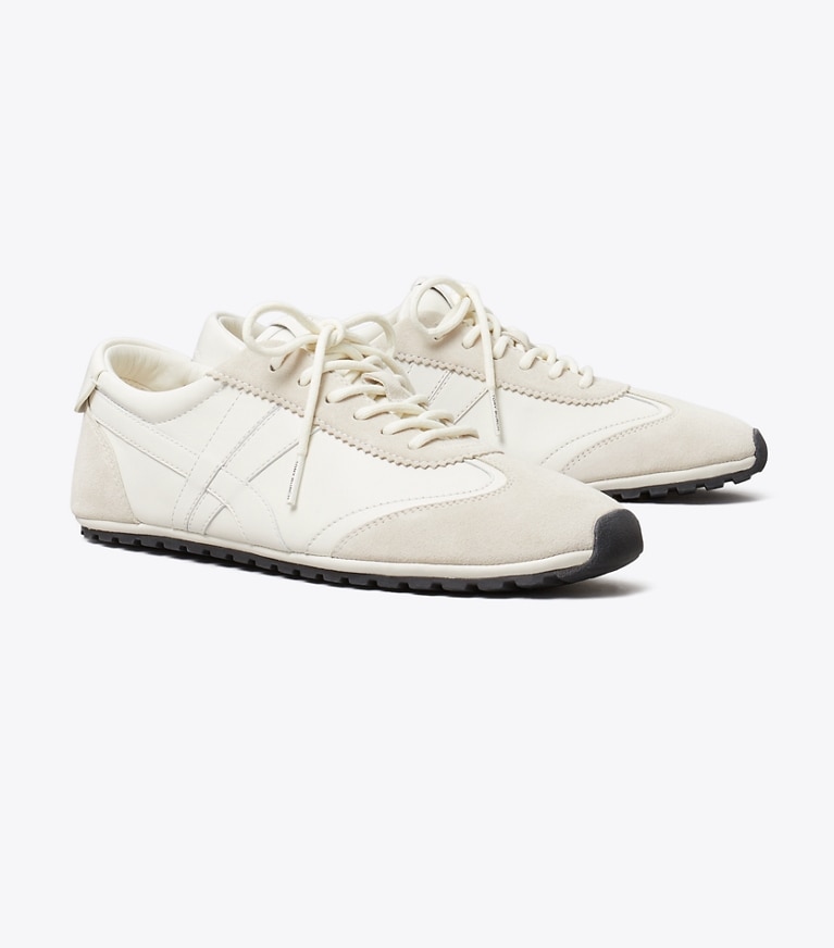 Tory Burch designer sneakers Hank Field Sneaker in CREAM / CREAM / CALCARE angle