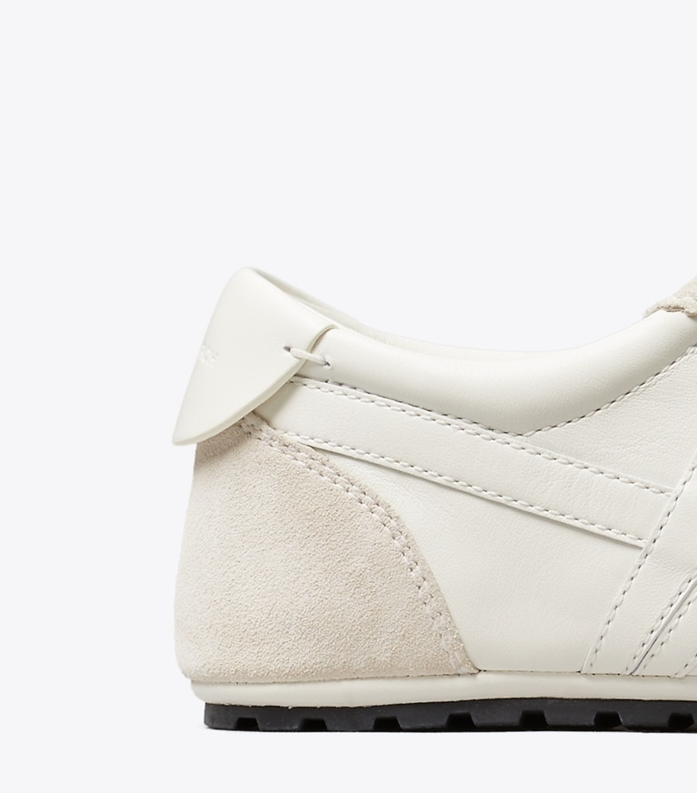 Tory Burch designer sneakers Hank Field Sneaker in CREAM / CREAM / CALCARE detail