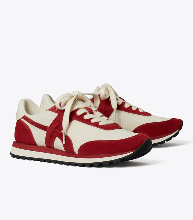 Tory Burch designer sneakers Hank Sneaker in NEW IVORY / GEMSTONE / TITANIUM WHITE angle