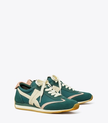 Tory Burch designer sneakers Hank Sneaker in Bottle Green / Pink Moon angle