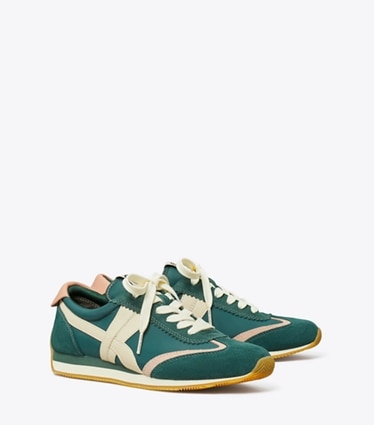 Tory Burch designer sneakers Hank Sneaker in Bottle Green / Pink Moon angle