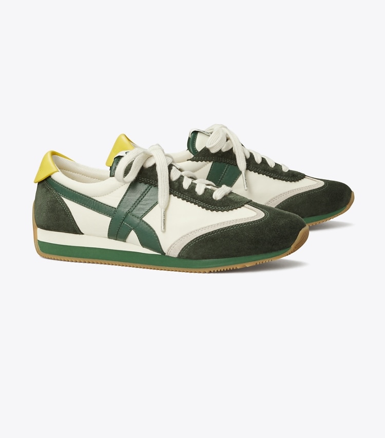 Tory Burch designer sneakers Hank Sneaker in New Ivory / MILITARE angle