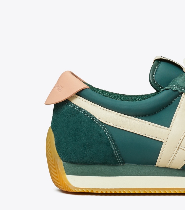 Tory Burch designer sneakers Hank Sneaker in Bottle Green / Pink Moon detail