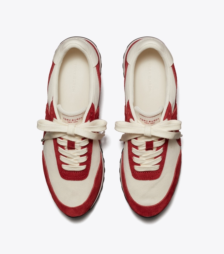 Tory Burch designer sneakers Hank Sneaker in NEW IVORY / GEMSTONE / TITANIUM WHITE overhead