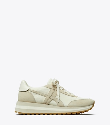 Tory Burch designer sneakers Hank Wedge Sneaker in NEW IVORY / CALCARE / TITANIUM WHITE side