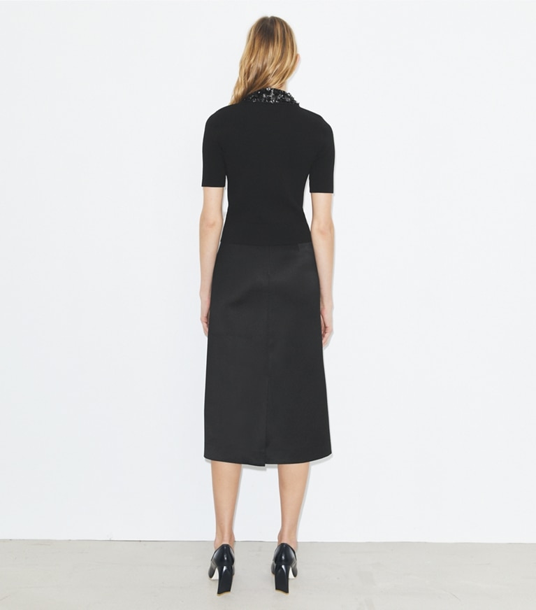 Tory Burch designer hauts Haut à manches courtes et col ornementé in Black front