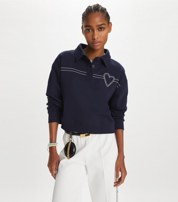 Tory Sport designer sweaters Heart Pickstitch Cotton Polo in Medium Navy on model detail